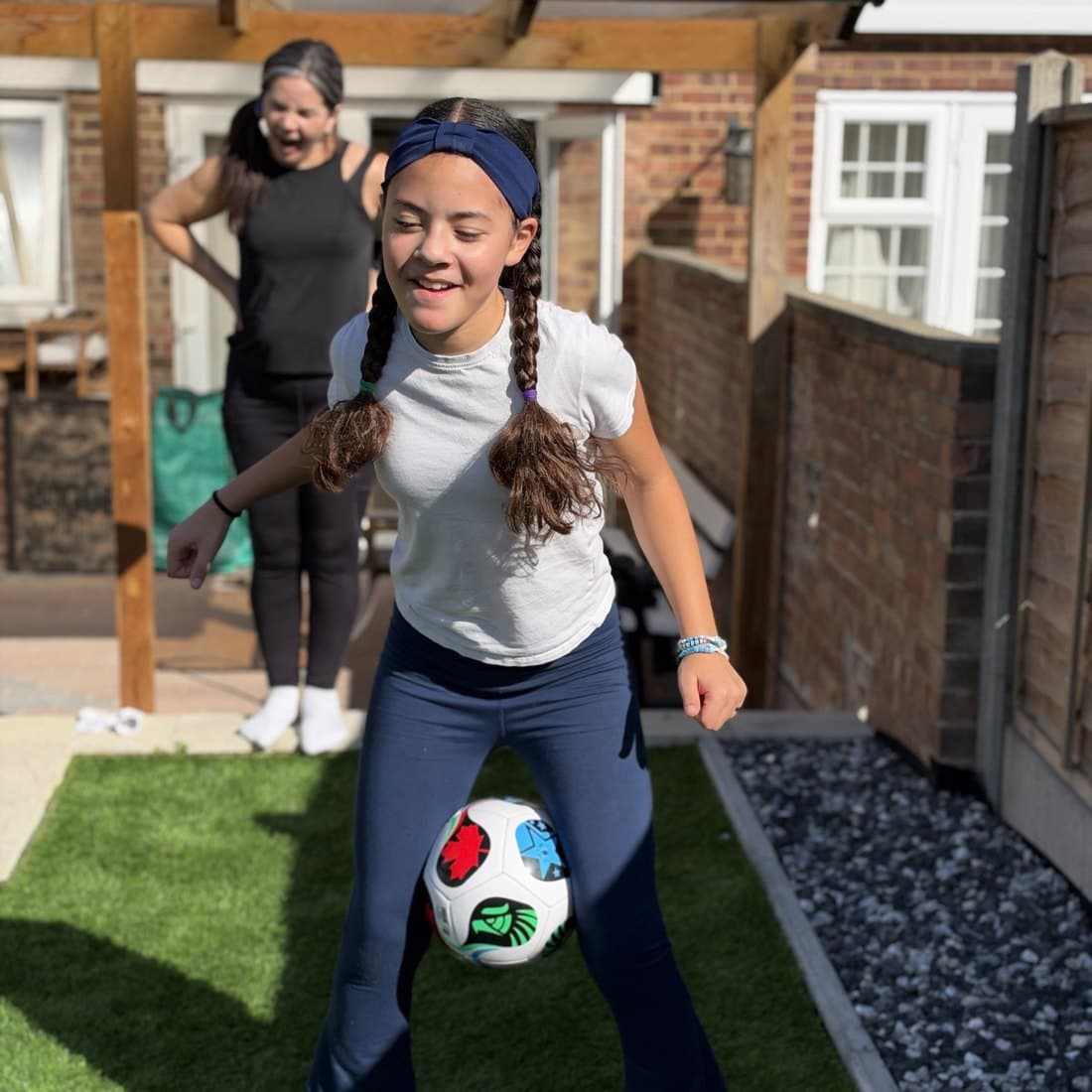 A young athlete laughing during a session