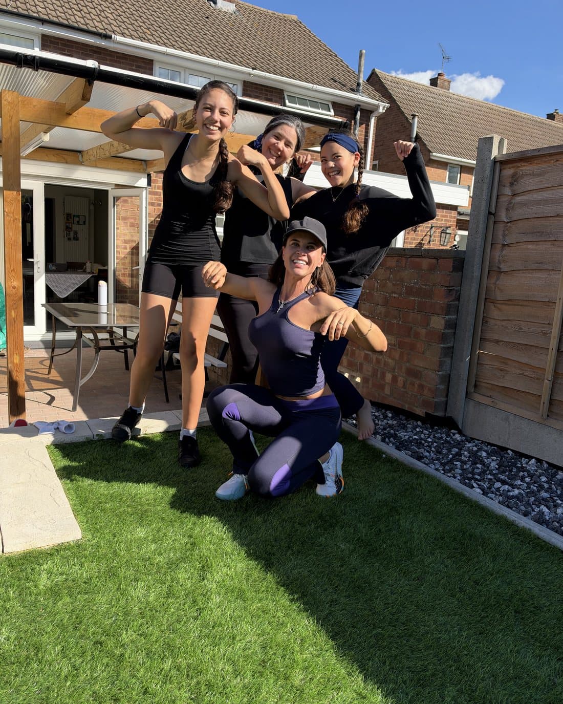 Vanessa and the children posing together after a session